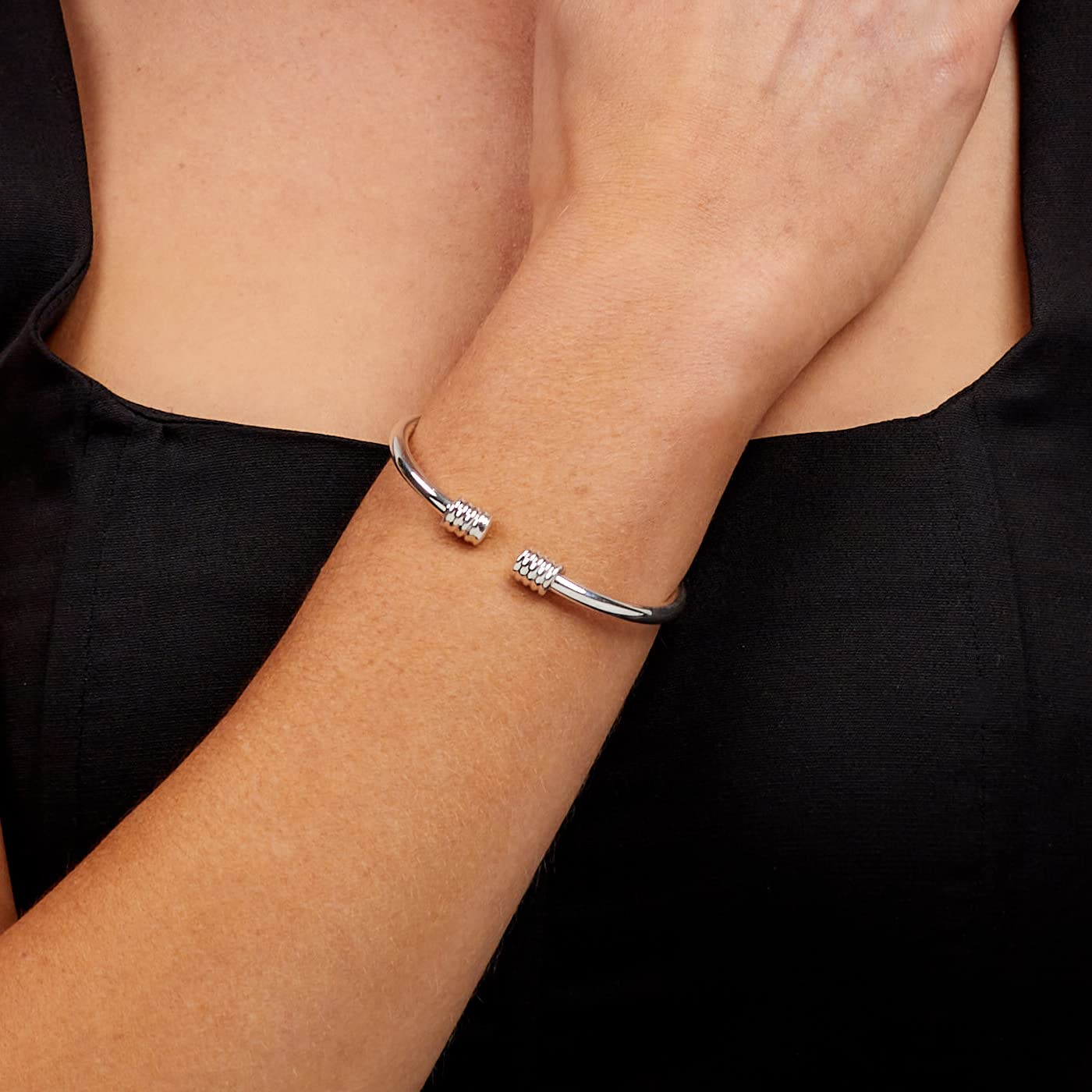 Sleek 925 sterling Silver Torque Bangle Bracelet on Female Model